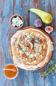 Fig pizza with pear and blue cheese