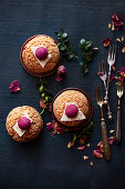 Mini raspberry cakes with dried rose petals