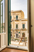 Old flat with balcony, view of neighboring building