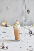 Festive latte with whipped cream on top