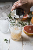 Cocktail with gin, vodka and pink grapefruit