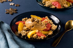 Caramel mocha mousse with oatmeal crumble and orange-grapefruit compote