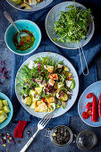 Avocado salad with mango, mozzarella and chili dressing