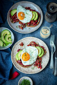 Roast bread with red kidney bean, avocado and fried egg