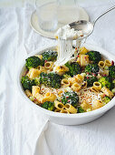 Self-saucing pasta casserole with broccoli, bacon and burrata