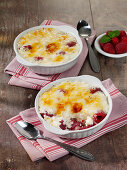 Flamed rice pudding with raspberries