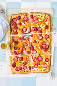 Puff pastry tart with cottage cheese, strawberries, apricots, thyme and honey