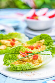 Coronation Chicken served in a lettuce wrap