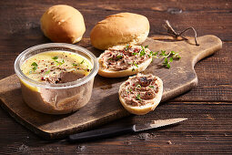 Homemade duck liver paté with small baguettes