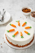 Carrot cake decorated with marzipan carrots