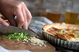 Chive quiche with anchovies and parmesan cheese
