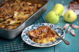 Oven baked pancakes with onions, apples, bacon and thyme