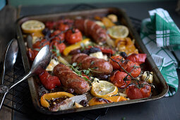 Salsiccia pan with peppers and tomatoes