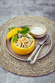 Stuffed round summer squash with couscous pearls and mint yogurt (vegetarian)