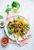 Pork belly zucchini skewers with potatoes