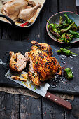 Spicy coconut chicken with pimentos-de-padron from the grill