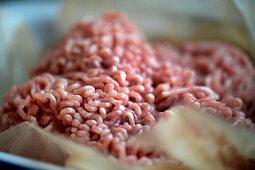 Raw minced pork on paper