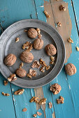 Walnuts on pewter plate