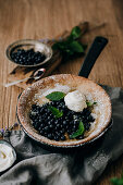 Dutch Baby with blueberries and mascarpone cream