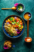 Cauliflower and peanut rice with vegetable curry and peanut sauce