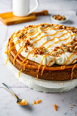 Pumpkin pie with cream cheese and roasted walnuts