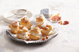 Caramel cream puffs with almonds