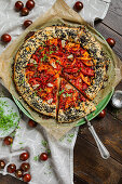 A savoury galette with tomatoes and black sesame seeds