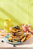 Blueberry spelt pancakes with soy bacon and cashew butter