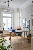 Simple desk on wooden floor in a study