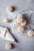 Homemade macarons decorated with snowflakes