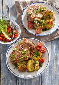 Roasted pork chops with herb potatoes