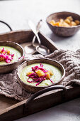 Vegetable soup with croutons and braised red cabbage