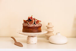 Sponge Cake topped with Nutella and Labneh Frosting and Fresh Figs
