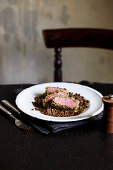 Lamb in a herb crust on a bed of lentils