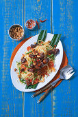 Sticky pork belly with green papaya salad and chilli lime dressing