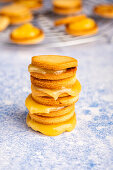Sandwich cookies with lemon curd, stacked