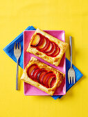 Puff pastry with red plums