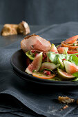 Figs with black forest ham, tomato and spinach salad