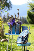 Blue pot with veronica, delphinium, and birch twigs