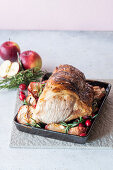 Pork baked with apples and cranberries