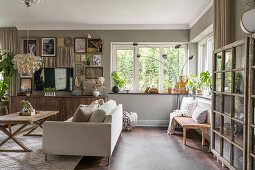 Living room in natural colors with wooden elements