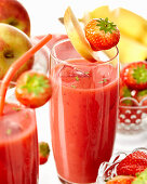 Smoothies made with strawberry, banana and apple