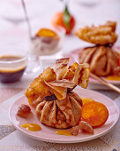 Crepe parcels filled with mandarins and chestnuts
