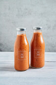 Homemade tomato sauce made from roasted tomatoes in glass bottles