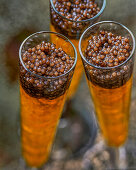 Vodka jelly with caviar served in champagne flutes (Close Up)