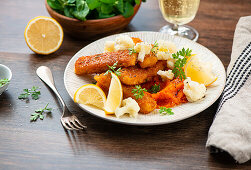 Fish fingers with pumpkin puree and cauliflower