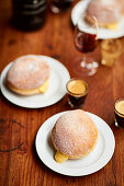 Pudding-filled doughnuts with espresso and wine