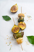 Fig skewers with scamorza cheese