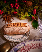 Sweet Christmas bread with 'Noel' inscription