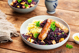 Sausage with red cabbage and mashed potatoes